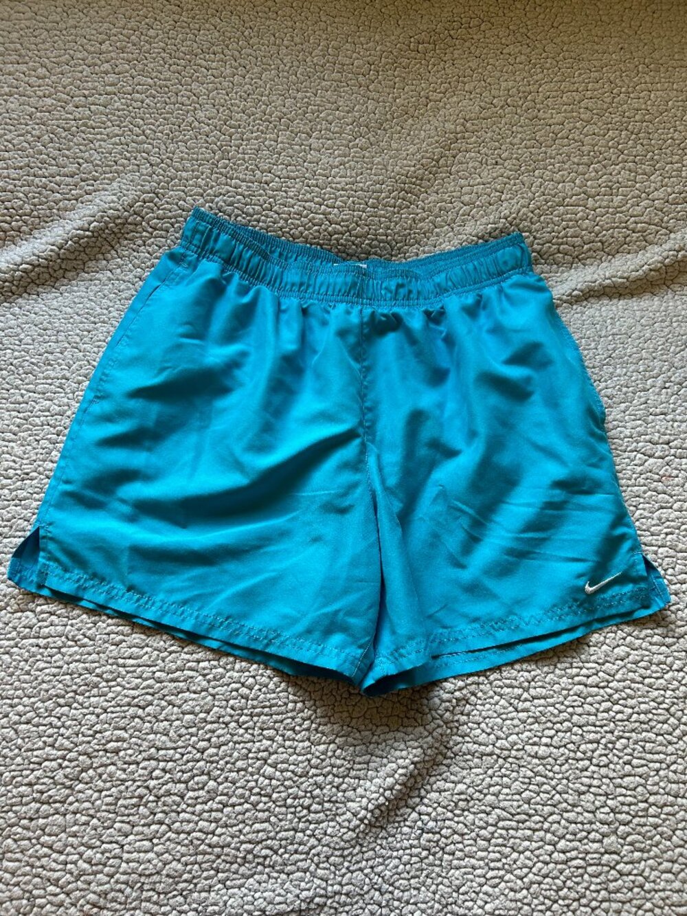 Nike -- blue swim trunks